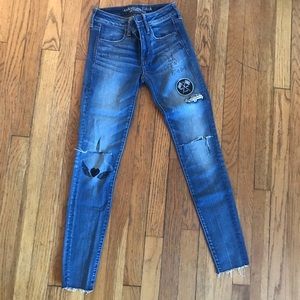 American Eagle super stretch  skinny jeans with cute details front and back.